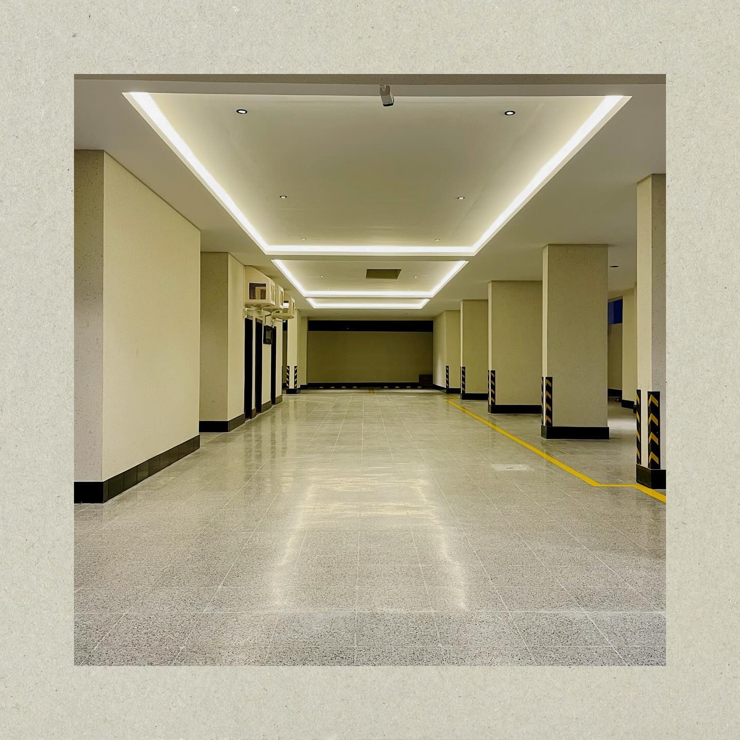 View of a midrise building with garage entrance